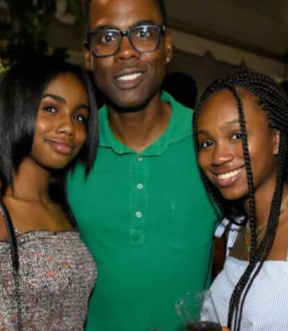 Zahra Savannah Rock with her sister Lola and father Chris Rock.